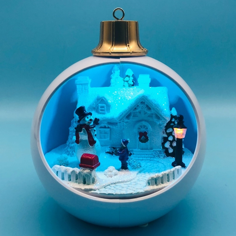 LED-Weihnachtsdorf mit Schneemann, der sich in der weißen Kugel bewegt
