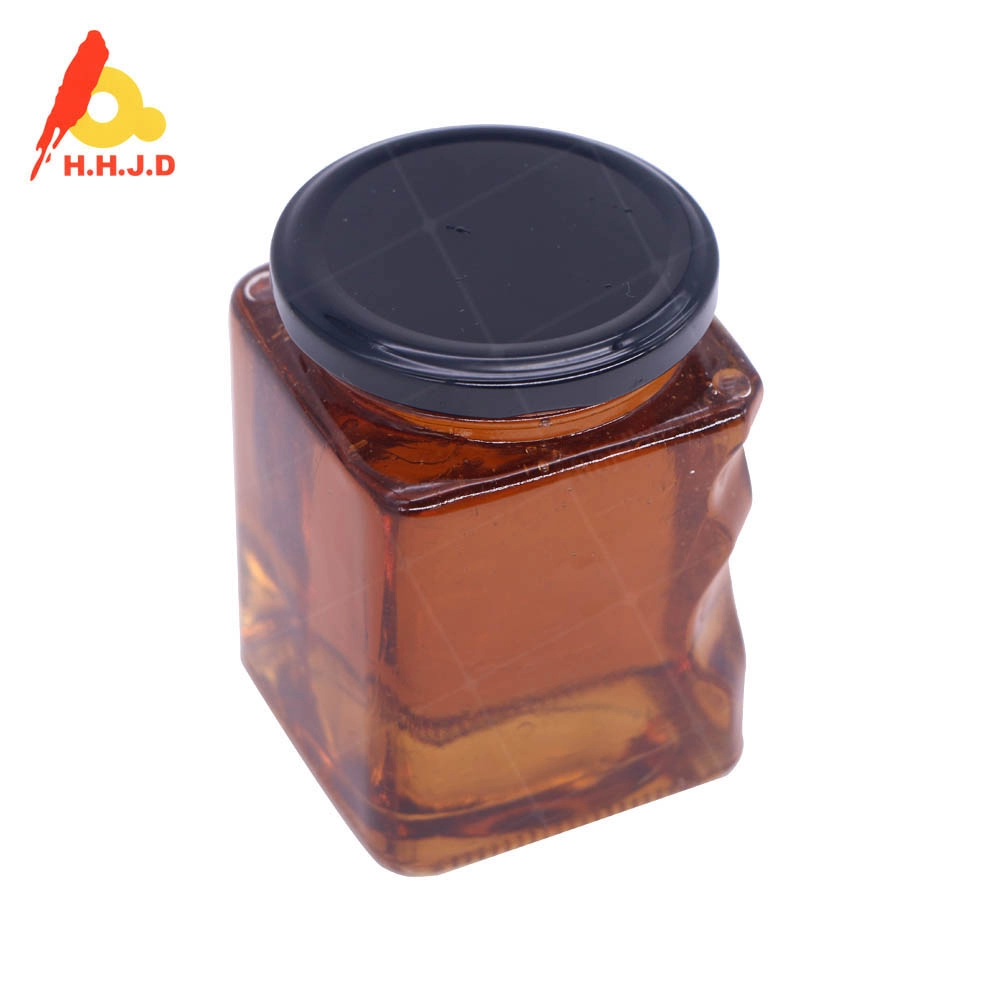 Kleine Flaschen aus Glas mit reinem natürlichem Honig