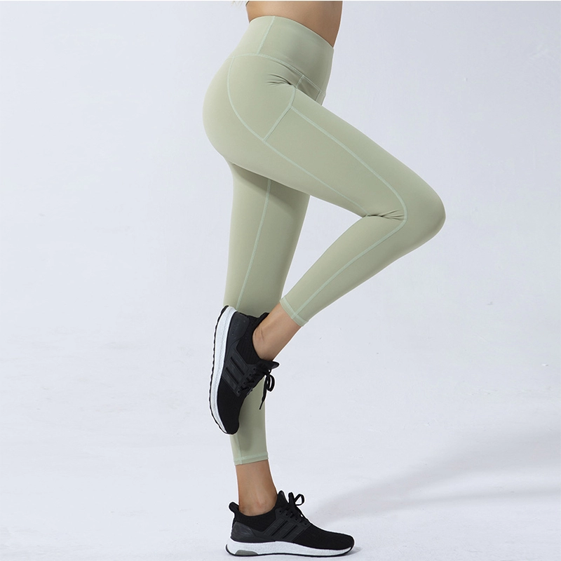 Elastische Yogahosen mit hoher Taille, die Stoff-Damen-Leggings schleifen