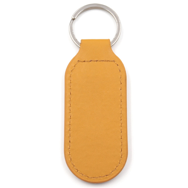 Hersteller von Schlüsselanhängern aus gelbem Leder mit Metalllogo